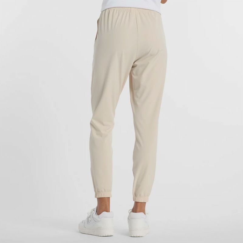 ニューバランスNewBalanceジムフィットネスヨガウェアボトムスロングパンツ長ズボンストレッチウーブンジョガーStretchWovenJoggerAWP51108-TWFレディース女性25SP春夏