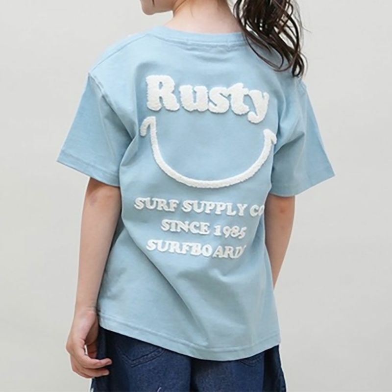 ラスティRUSTYサーフィンサーフウェア半袖Tシャツバックニコちゃん相良刺繍半袖Tシャツ965-505ジュニアキッズ子ども男の子女の子25SP春夏
