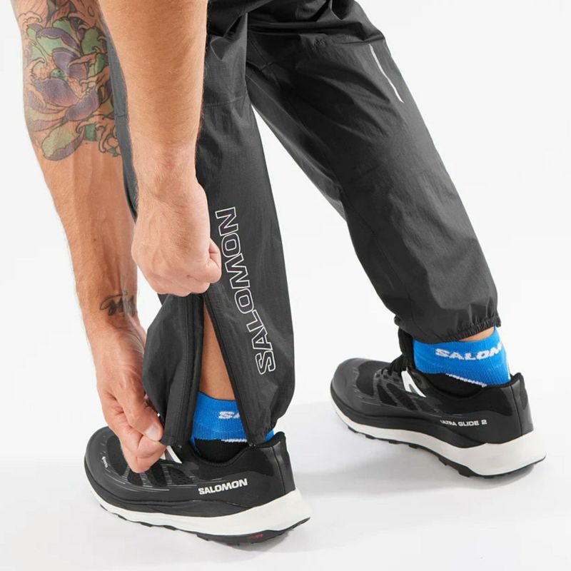 サロモンSALOMONランニングウェアボトムスロングパンツ長ズボンBONATTIWATERPROOFPANTSLC2059300メンズレディースユニセックス25FA秋冬