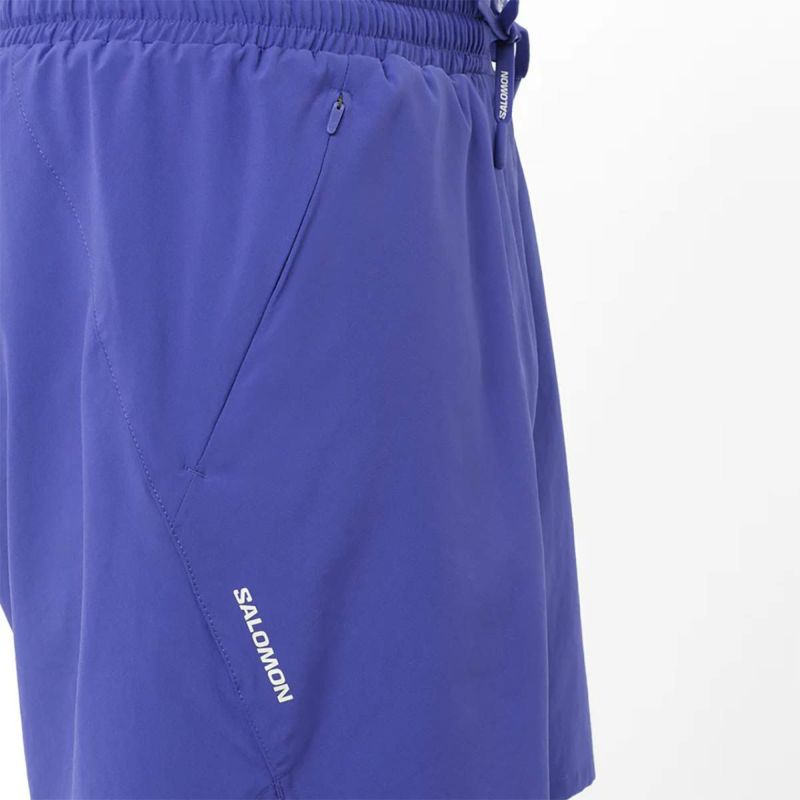 サロモンSALOMONランニングウェアボトムスショートハーフパンツ短パンSHKOUTCORE5SHORTSLC2641000メンズ男性24FA秋冬