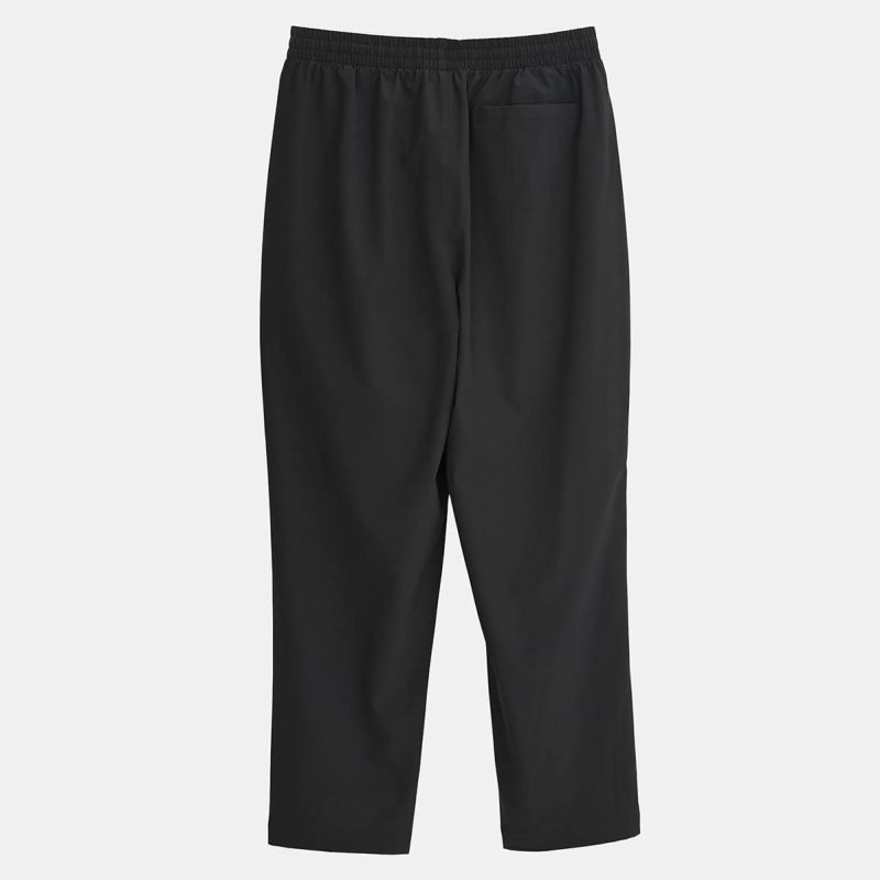 ニューバランスNewBalanceジムフィットネスヨガウェアボトムスロングパンツ長ズボンBrushedTricotLinedWovenTrackPantTaperedAWP53171-BKレディース女性25FA秋冬